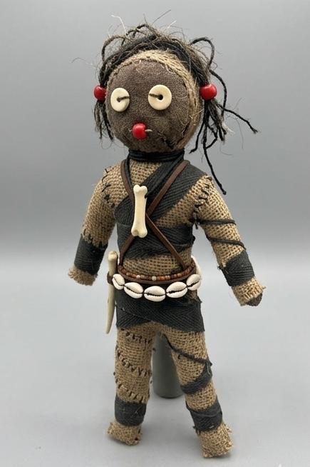 Guardian Spirit Doll with bone pendant and cowrie shell belt detail