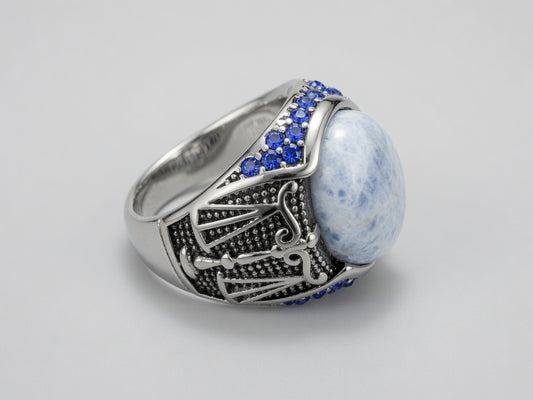 King Djinn power ring with blue sodalite stone and engraved silver-tone band