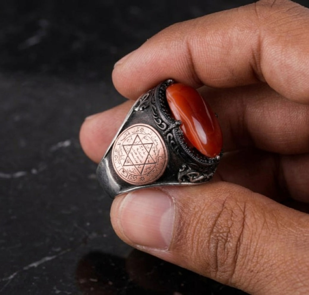 Seal of Solomon red agate ring held in hand showing scale and side engraving