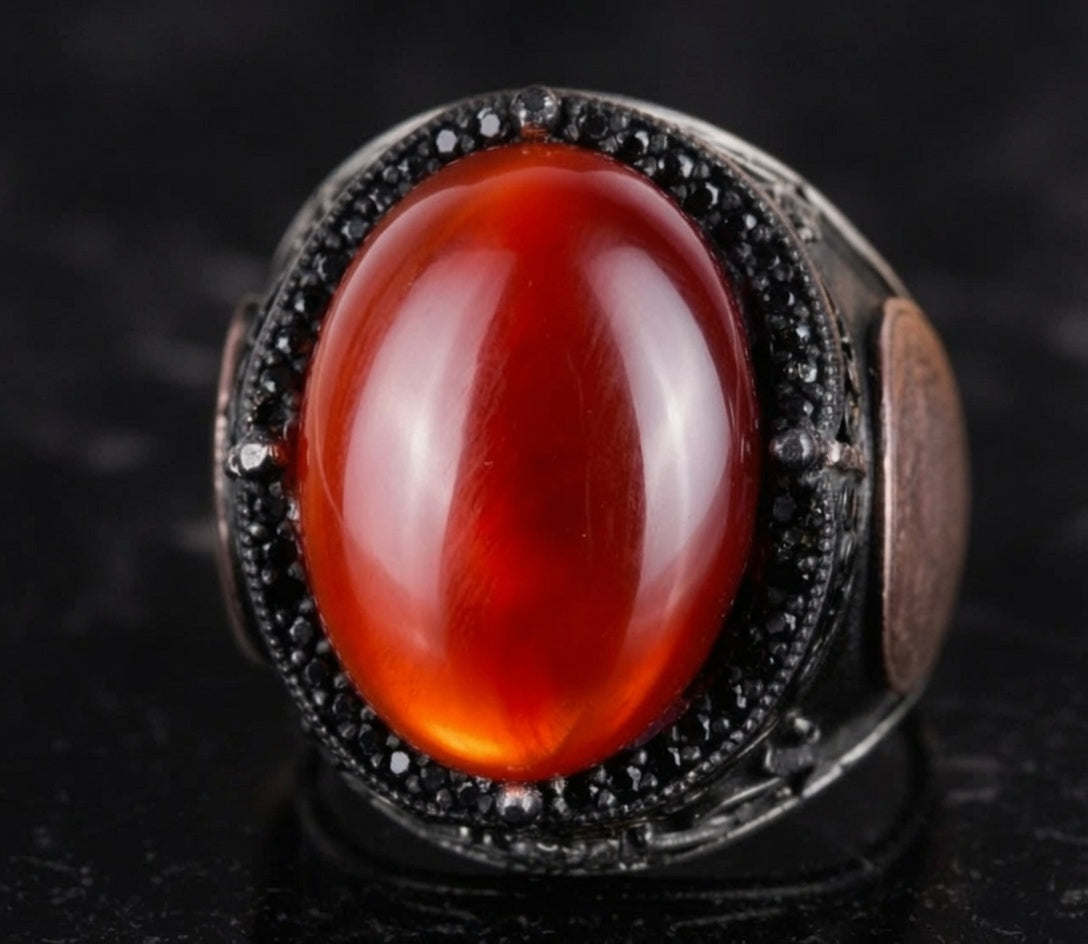Close-up of natural red agate carnelian cabochon in Seal of Solomon ring